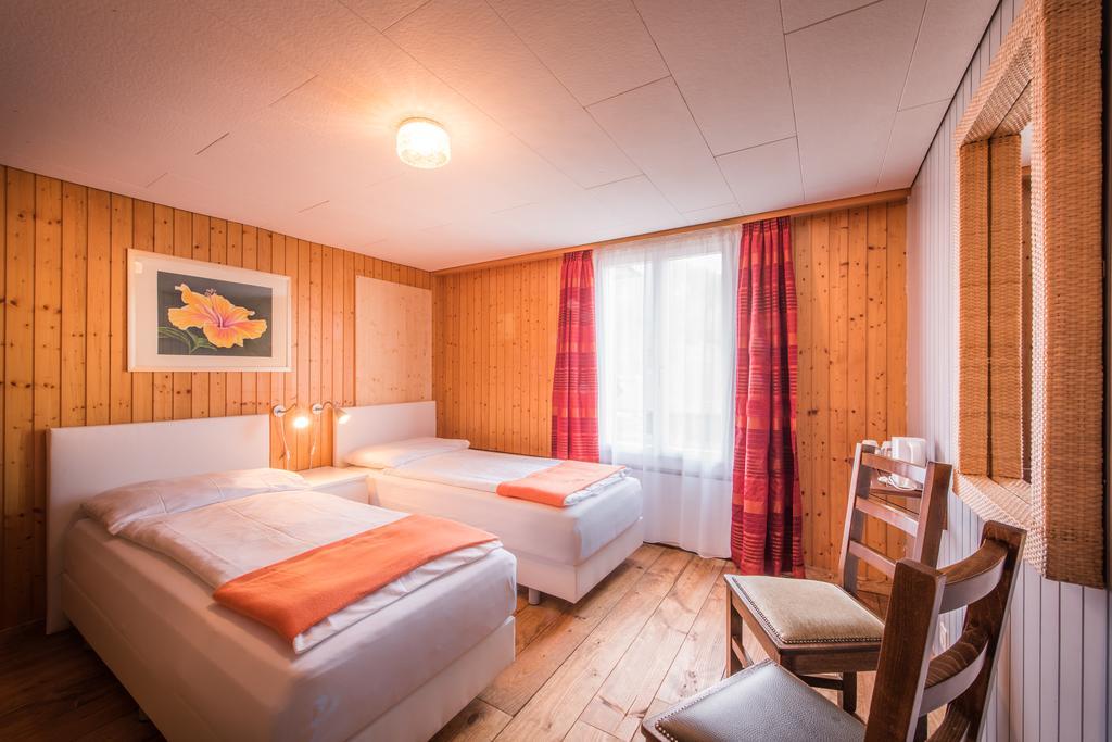 Hotel Tell And Apartments Unterseen Szoba fotó
